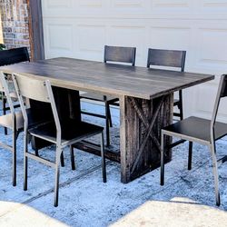 71" 31" 30H  Dining table and 6 chairs. Not wood, but sturdy.