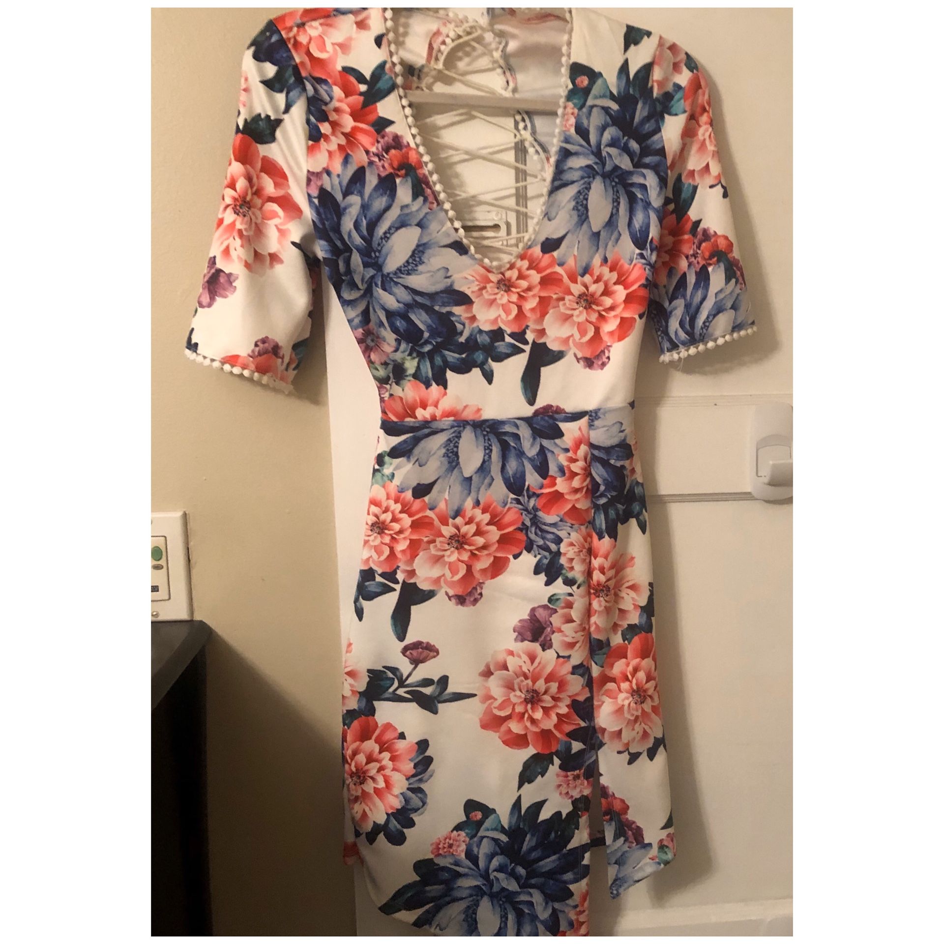 Floral asymmetrical dress with front slit.