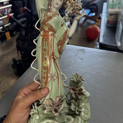 Vintage porcelain statue