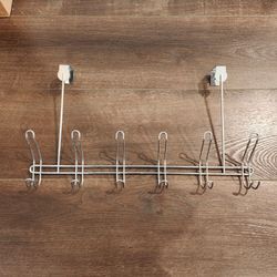 over-the-door metal hook rack with a chrome finish, 6 pairs of double hooks (12 hooks total), great condition