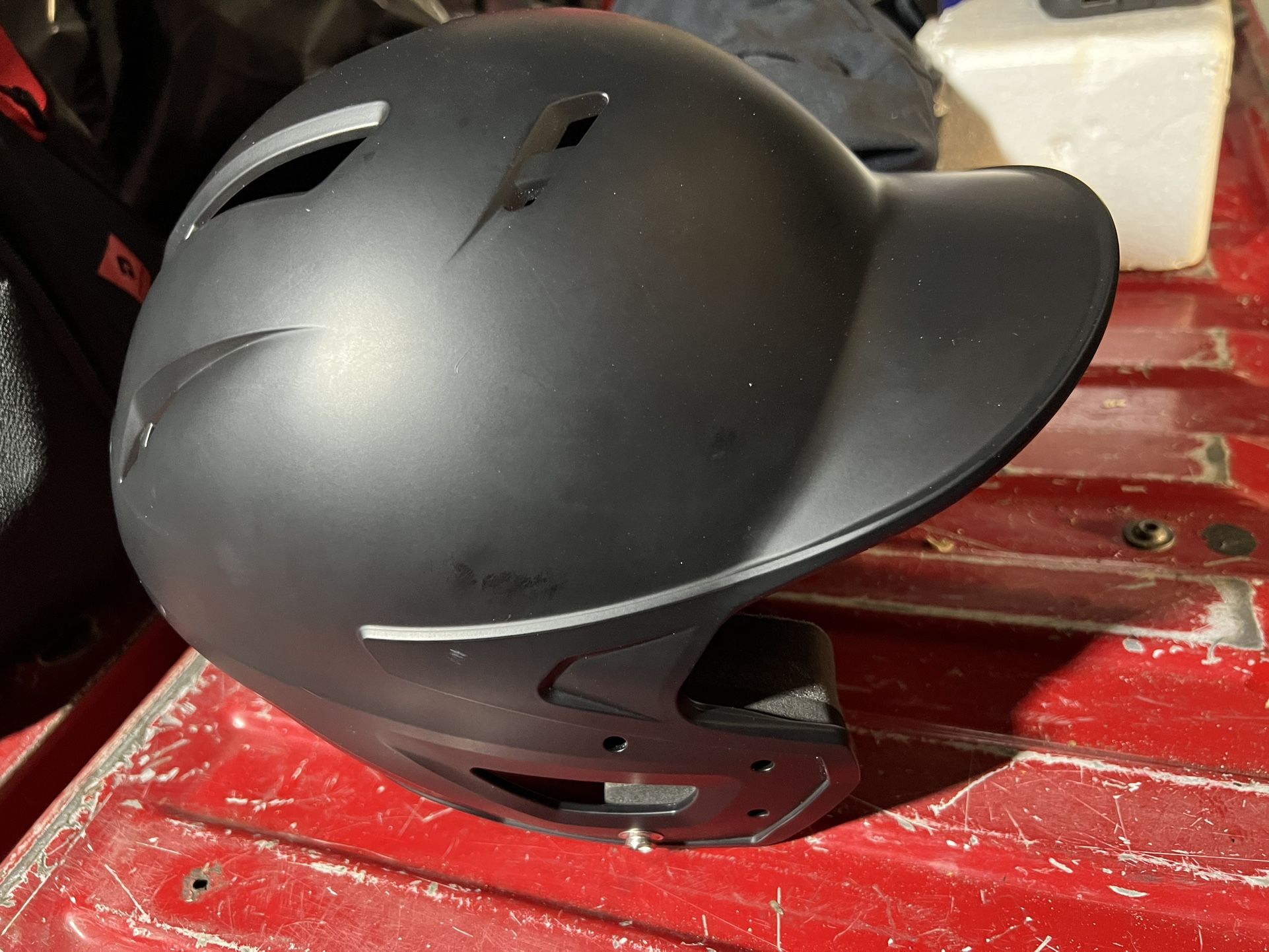 Baseball gloves, shoes, helmet and backpack