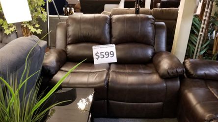 Brand new reclining loveseat