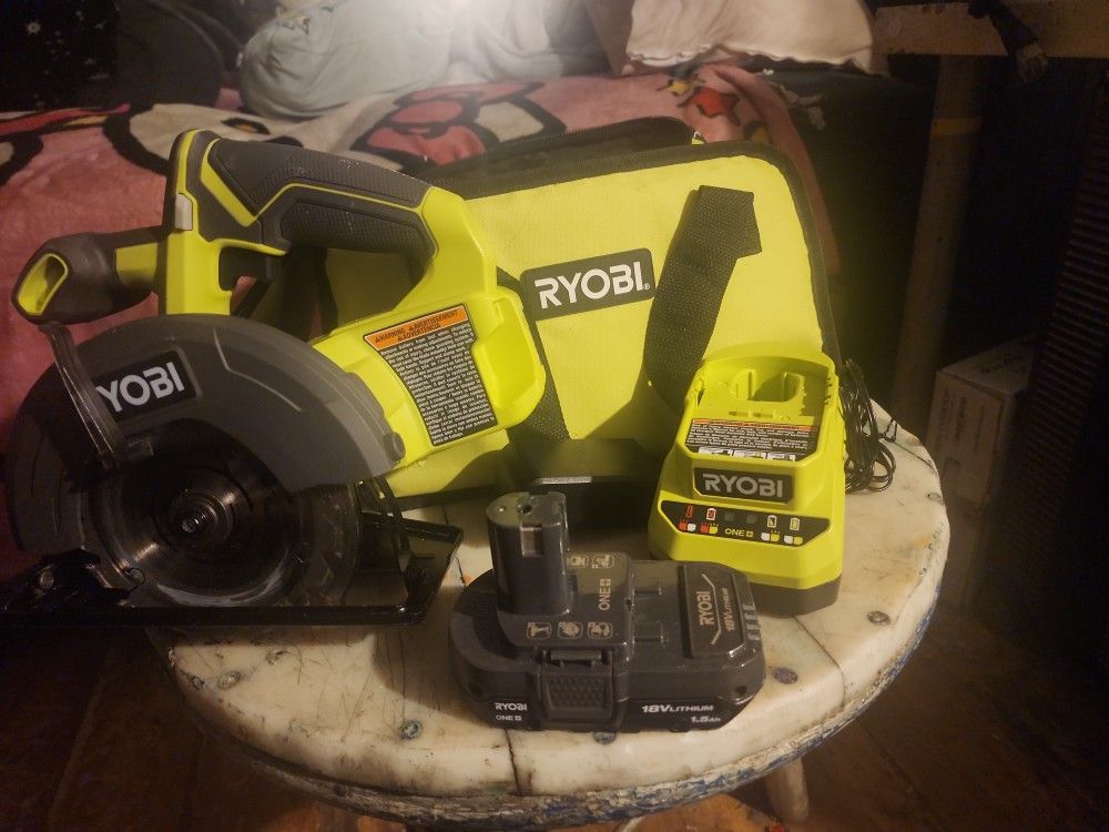Ryobi ONE + SAW AND TWO 18V LITHIUM 1.6AH BATTERIES.