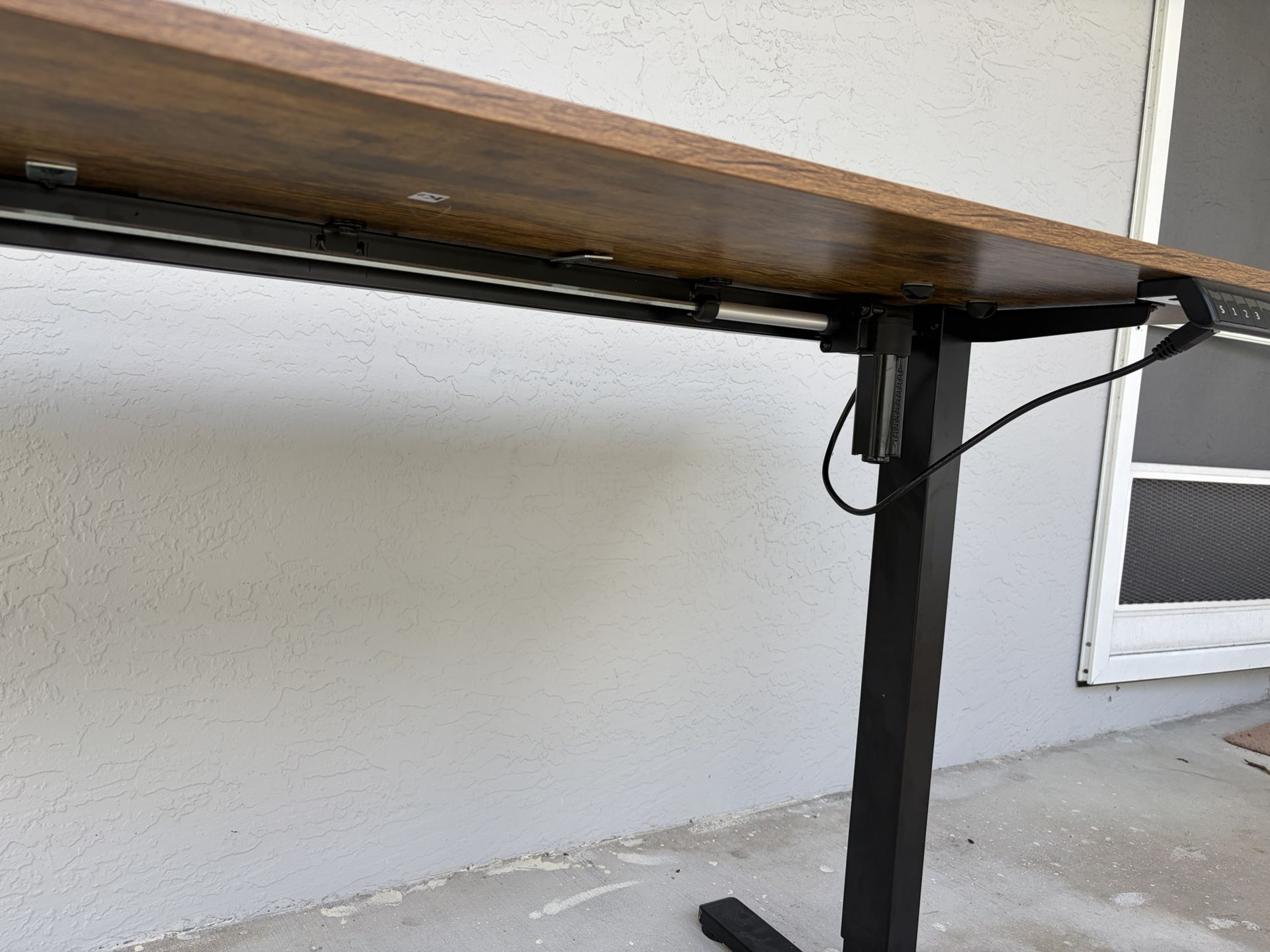Electric adjustable height desk.
