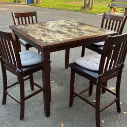Dining Table And Four Chairs