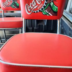 4 Coke. CHairs And Table