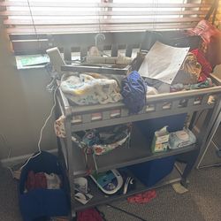 Grey baby changer with mat