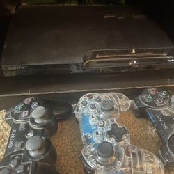 PS3 And 3 Controllers 