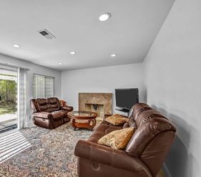 MOVING SALE! Leather brown couches reclinable