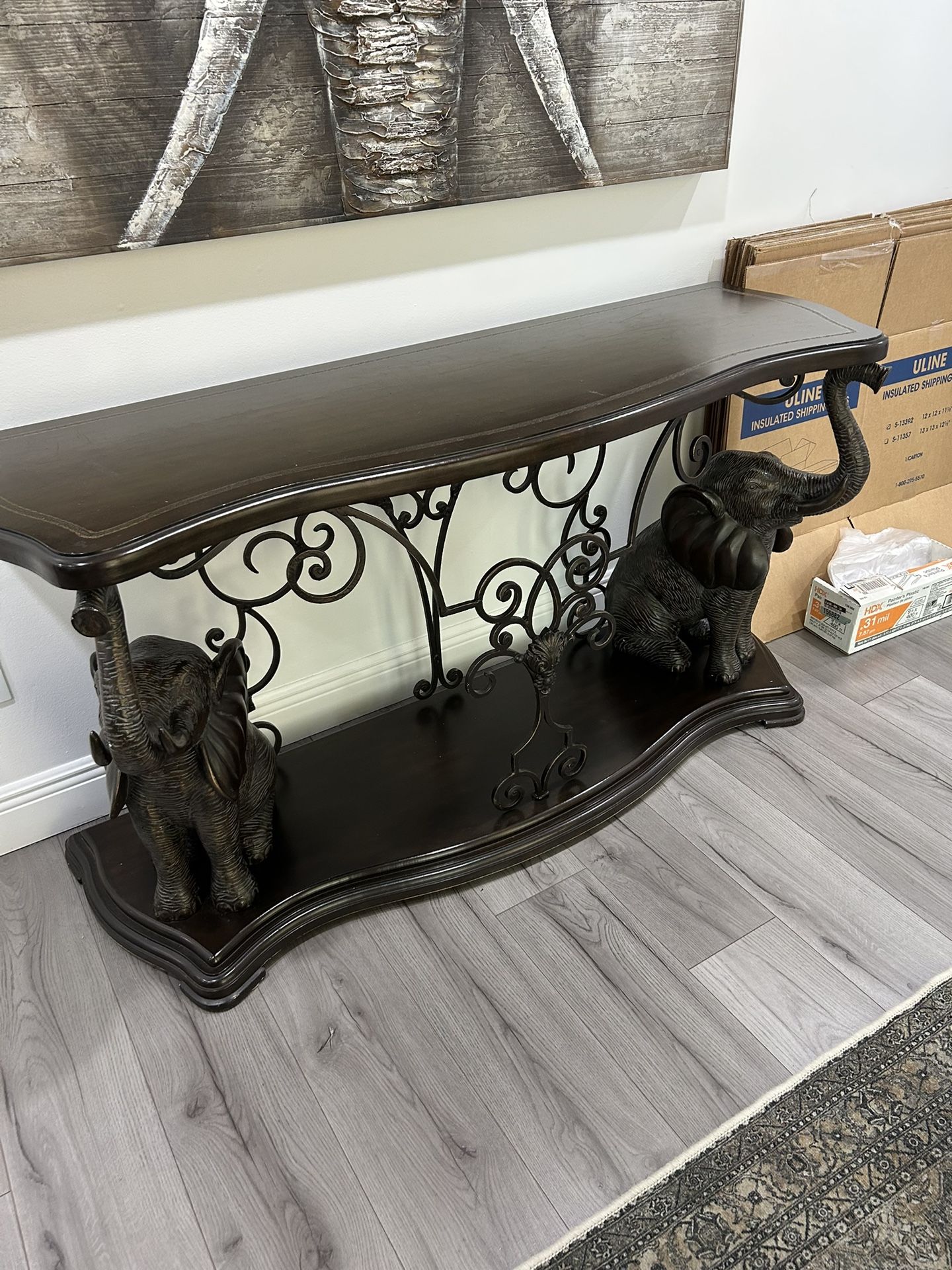 console table (also known as an entryway table or sofa table).
