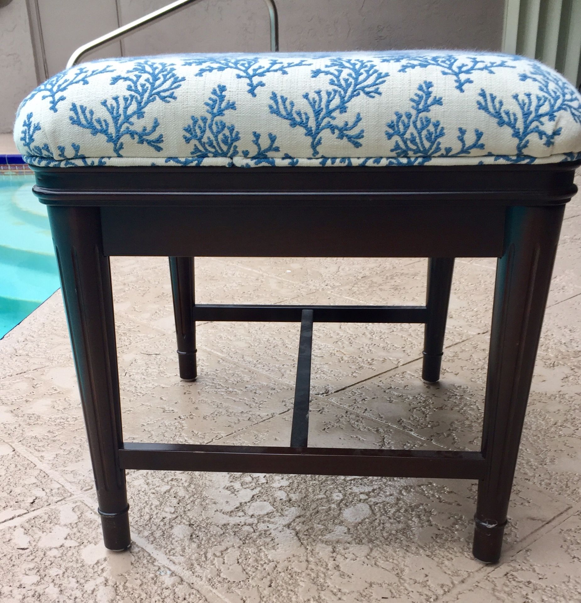 solid wood, fabric in excellent condition . Heavy solid piece!!! Bench seat or ottoman or side table -