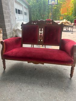 Red velvet love seat