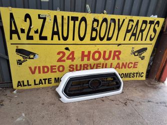 TOYOTA TACOMA 2016-2021 GRILLE OEM STOCK#TACOM126K
