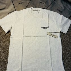 Light oatmeal essential fear of god shirts
