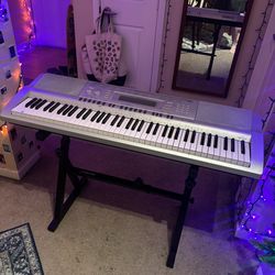 Electric Keyboard (Casio WK-210) with Stand and Power Cord