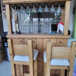 Bar set with two high stools, solid wood. (Coconut Creek, FI)
