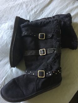 Justice boot size 6 just need to be clean or wash they was in storage