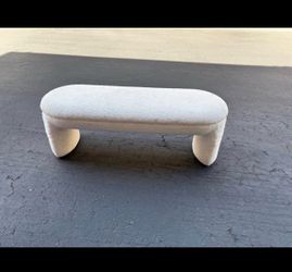 Modern white boucle pill bench