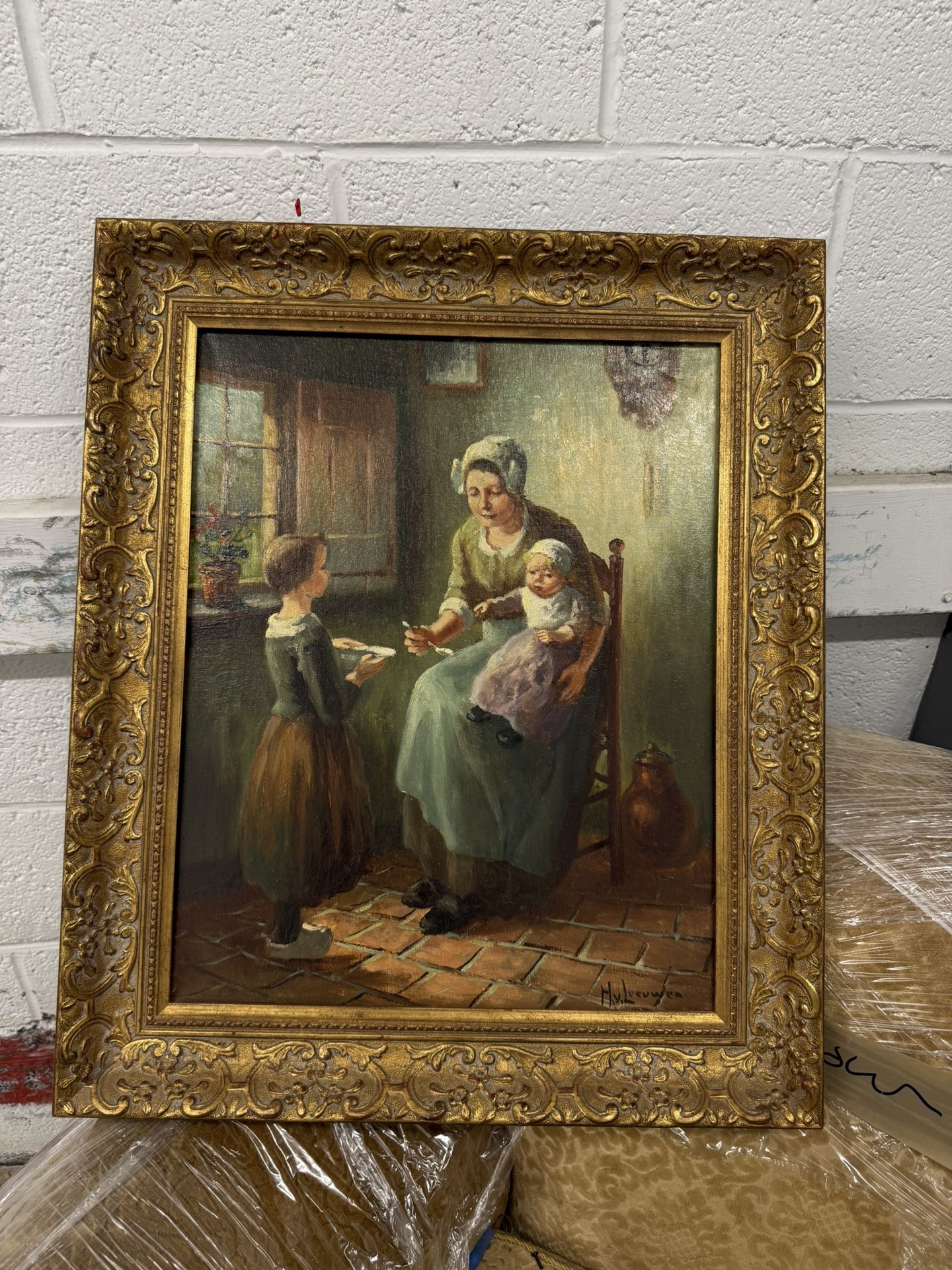 The painting “De eerste hapjes pap” by Henk van Leeuwen van Oudewater (1890–1972)