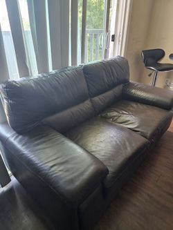 Slightly used brown leather furniture