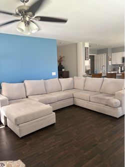 Gray upholdered sectional sofa $99