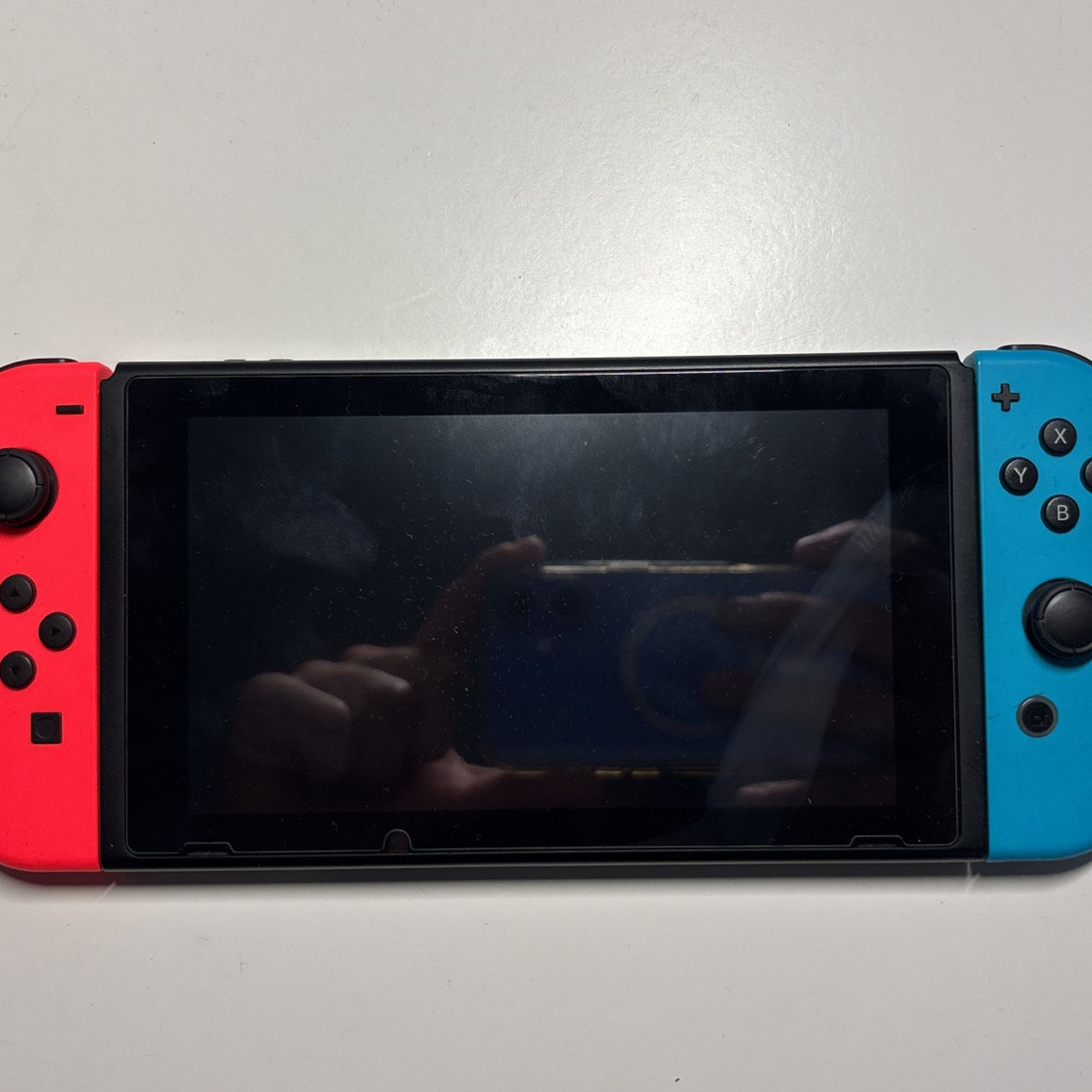Nintendo Switch (2017 model) + 7 games (box, ac adapter, extra joy cons included) , 2 extra pairs of joy cons