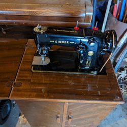 Singer Sewing Machine And Cabinet 