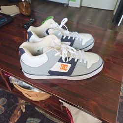 DC men's mid top skate shoes