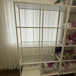 White steel shelves with glass