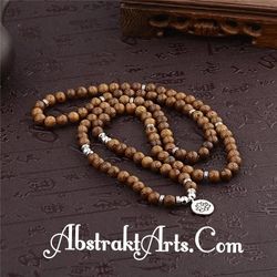 Natural Sandalwood  108 Beads 
Unisex Bracelet With Lotus Pendant.
