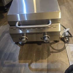 MEGAMASTER  2 BURNER PORTABLE  GAS GRILL MODEL #(contact info removed)M