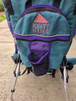 Kelty Kids

Hiking Child Carrier Backpack - Teal/Purple