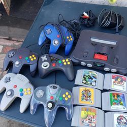 8 Original N 64 Games. 5 Controlelrs. 1 Red Graphics card. 2 Memory Cards. All cables & Nintendo N64 $350! Firm All Combo Or Trade Are welcome
