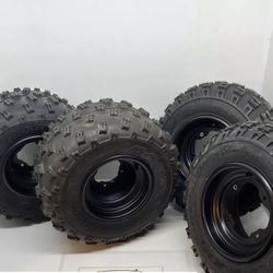 STOCK FRONT & REAR WHEELS AND TIRES FROM A 2023 YFZ450R