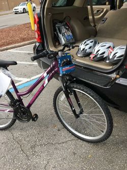 26 inch brand new bike with lock and three brand new helmet