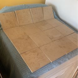 16 unused beige floor tiles 5.5” Each