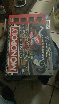 Sealed new monopoly gamer Mario cart