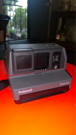 Polaroid impulse camera