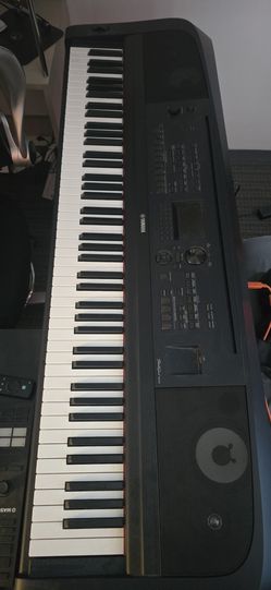 Yamaha DGX-670B 88-key weighted digital piano with music rest and sustain