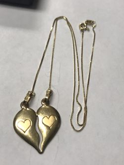 18k love hurt pendant 18 inches long 5grams weight