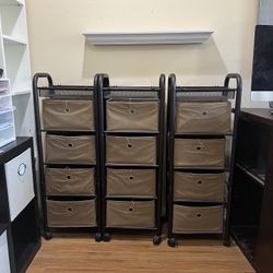 3 Rolling Metal Shelves with Fabric Bins. Metal shelves are in excellent condition, bins are in lightly used condition.