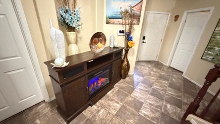Beautiful rustic fireplace /tv stand with Bluetooth speakers 5 colors of flames 68”