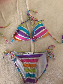 Pair of small bikinis with swim skirt