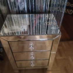 Mirror chest of drawers has two small cracks?