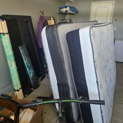 Free furniture; queen mattresses, dining table and chairs, 2 queen bed frames
