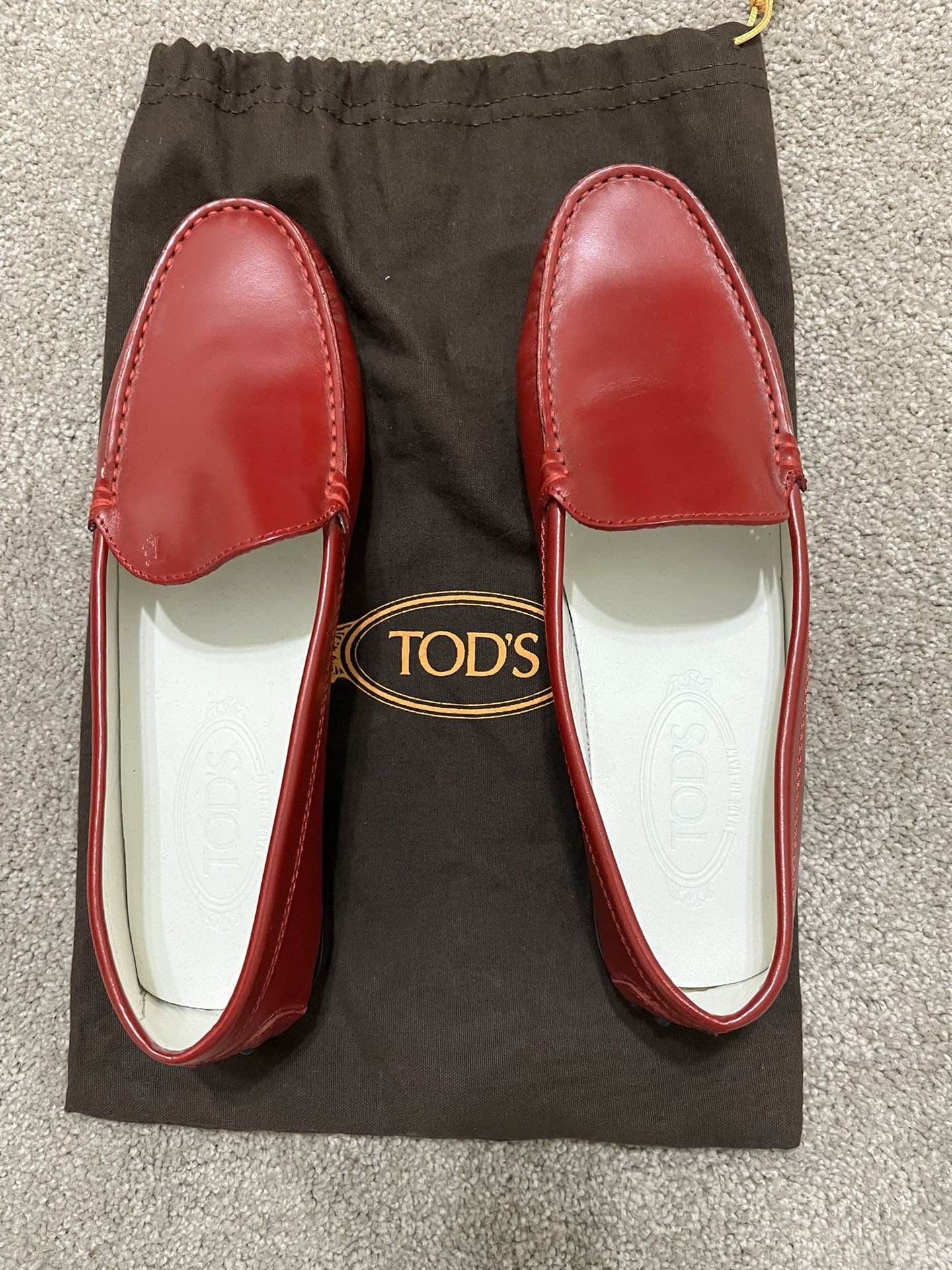 Tod’s Red Loafers