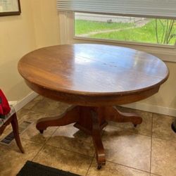 Round Pedestal Base Dining Table With Leaves 