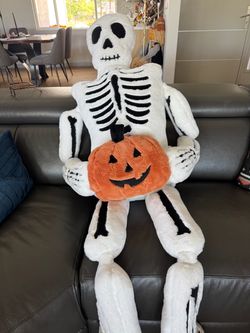 Large Plush Skeleton with Pumpkin Halloween Decoration