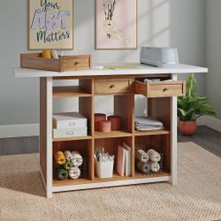 3-drawer table with shelf sections in the cabinet