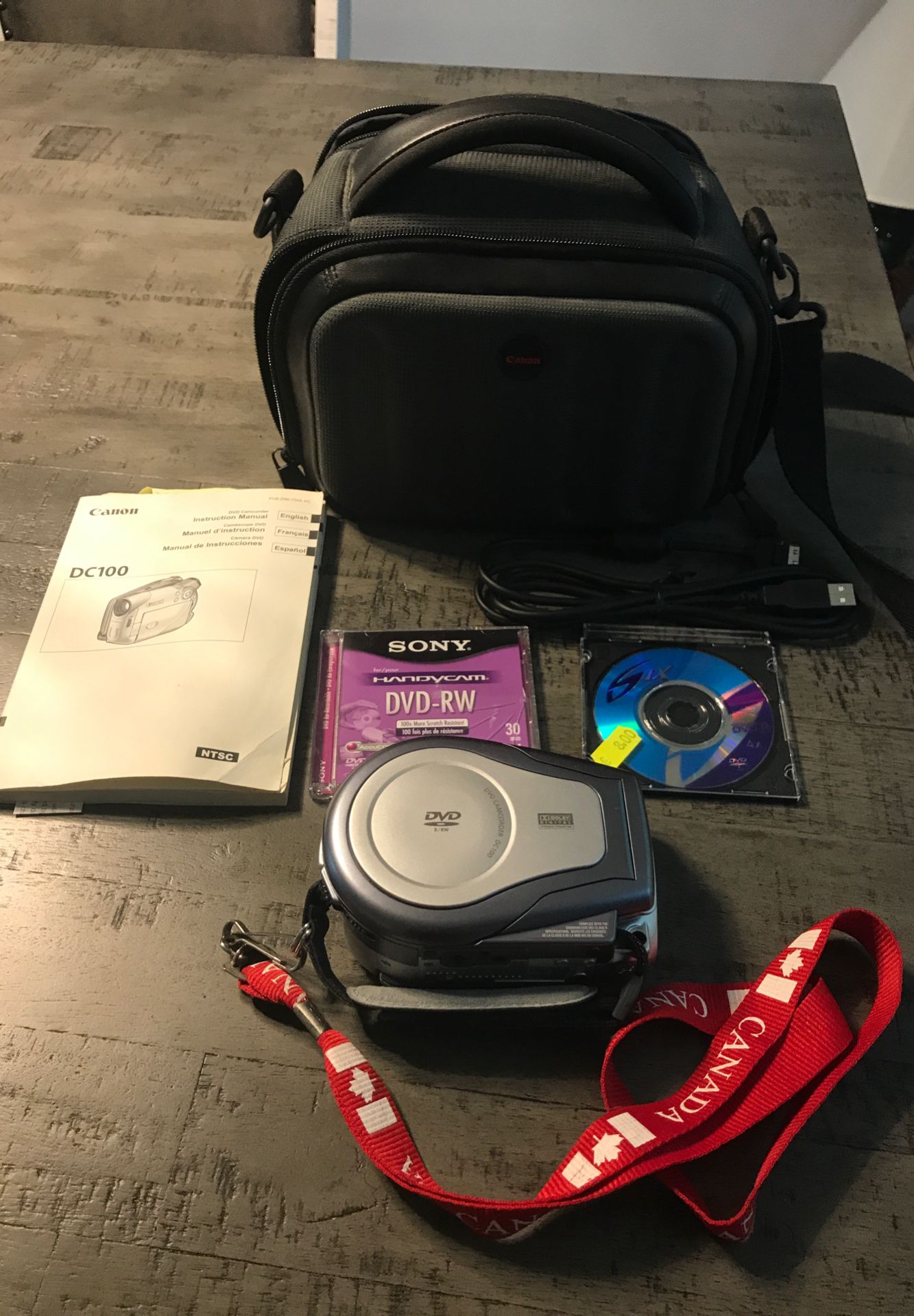 Canon DC 100 manual camera